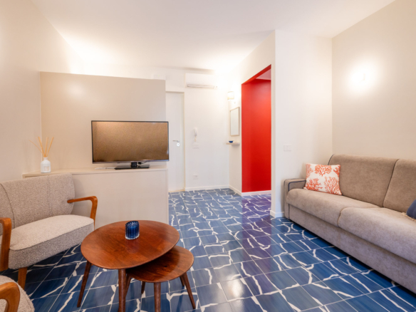 The Coral House Sorrento - seating area with widescreen tv